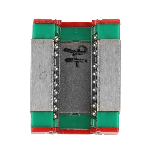Close-up of Compact Miniature Linear Rail Guide with 12mm width, metal and plastic construction, view of the ball bearing system