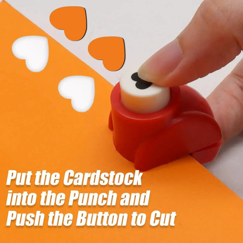 Using 12 Piece Craft Hole Punch Shapes Set for scrapbooking and card making, hand punching heart shape with red mini puncher.
