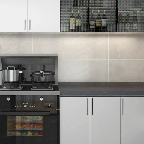 Modern kitchen featuring 5 Inch Cabinet Pulls Matte Black Zinc Alloy Drawer Pulls on white cabinets, highlighting sleek design.