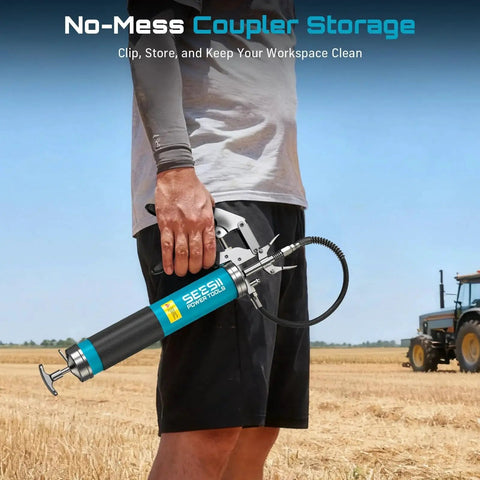 Person holding the Heavy Duty 8000 PSI Pistol Grip Grease Gun Kit With 14 Ounces Capacity Quick Release Coupler in a field.