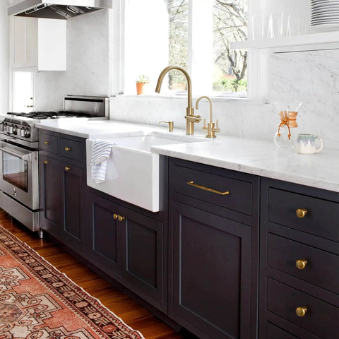 Modern kitchen with marble counter and black cabinets featuring vintage brass zinc alloy cabinet handles set of 6 5.03 inch center to center antique retro pulls with screws for kitchen and bedroom cabinets furniture hardware durable rust resistant finish ideal for dressers wardrobes and vanities.