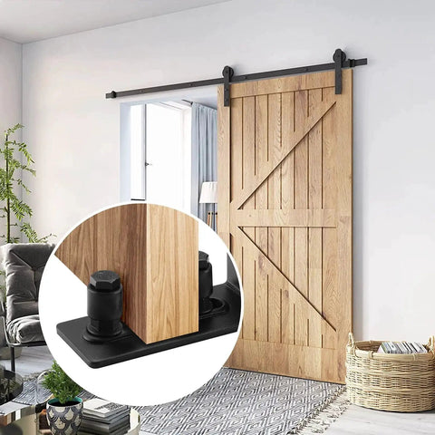 Image showing Barn Door Floor Guide Set Black Powder Coated Carbon Steel Construction With Durable POM Nylon Rollers on installed sliding door.