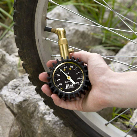 JACO Elite tire pressure gauge; brass body, black dial, used on bicycle tire valve up to 100 psi
