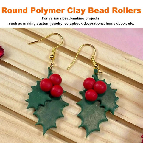 Round shape polymer clay bead roller earrings with red beads and green leaf design for DIY jewelry crafting on wood surface.