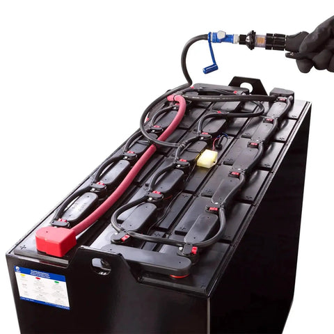 Direct Fill Link For Low Profile Battery Watering Systems With Quick Connect installed on a battery, showing hose connection.