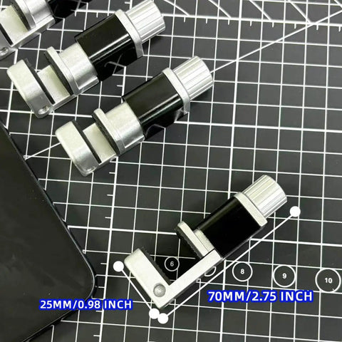 Adjustable Screen Repair Clamps Kit For Phones And Tablets, Universal Clip Fixtures to hold screens, shown on grid surface