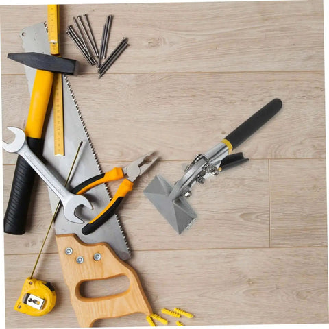 Manual Metal Bender With Straight Jaw Hand Seamer for sheet metal, surrounded by various tools on a wooden surface