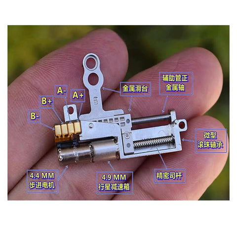 Close-up of 11.5mm Stroke Linear Actuator With 5mm Precision Planetary Gearbox Pro Grade in hand showcasing detailed components.