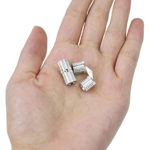 Brass Concealed Barrel Hinge Set For Cabinets And Jewelry Boxes With 180 Degree Opening Hidden Hinges For Wooden Boxes And Furniture 8mm Diameter Pack Of 8 Coshar shown in a hand.