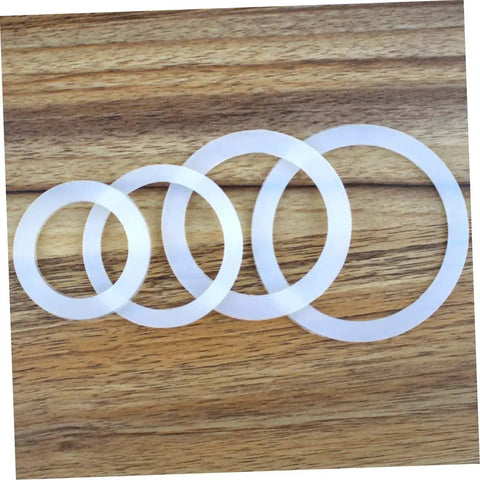 Silicone Gasket Replacement Set 10 Pieces For Coffee Pot Lids And Jar Seals on wood surface