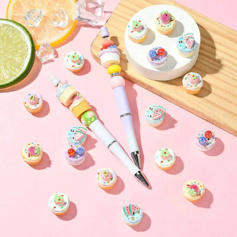 Imitation Food Resin Beads Set 30 Pcs 3D Fruit Cupcake Mini Dessert Spacers on pink surface with accessories and decor.