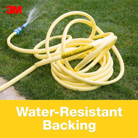 Yellow Colored Duct Tape with Strong Adhesive and Water-Resistant Backing, shown in grass with hose, for multi-surface use.