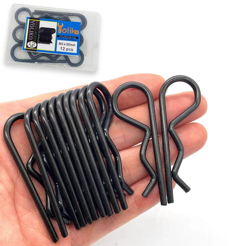 Hand holding Heavy Duty 12 Pack R Clips For Trailers Trucks Carts And Mowers 60mm Long 3mm Wire Diameter Zinc Black Finish