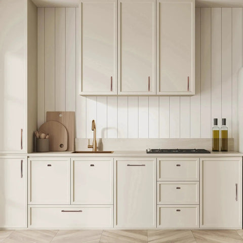Modern kitchen with cream cabinets featuring 5 Inch 128mm Brushed Antique Copper Cabinet Pulls Handles Set 10 Pack Made From Solid Zinc Long Lasting Drawer Knobs.