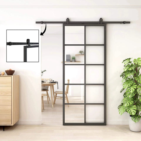 Heavy Duty Black Top Mounted Barn Door Hardware Kit For Aluminum Framed Glass Doors With A 6.6 Foot Rail System Includes Two 3.3 Foot Rails Easy To Assemble Ideal For Glass Panel Doors And Modern Home Renovations, installed view in modern interior with inset hardware details.