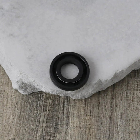 Six Pack TC Oil Seal Nitrile Rotary Shaft Seal Double Lip 12x24x4.5mm shown on a stone surface for industrial equipment