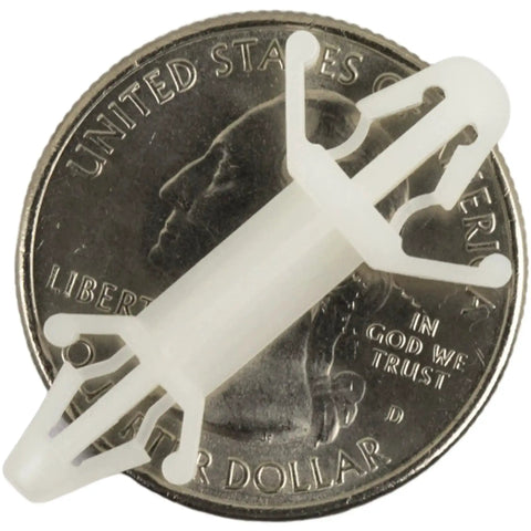 Double Head PCB Spacer With Reverse Locking Aircraft Style Nylon Insulation Bracket on a coin for size reference.