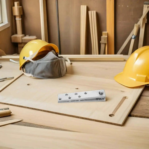 Heavy Duty Hidden Door Hinge 360 Degree Stainless Steel Pivot Concealed Hardware on a tabletop with construction tools