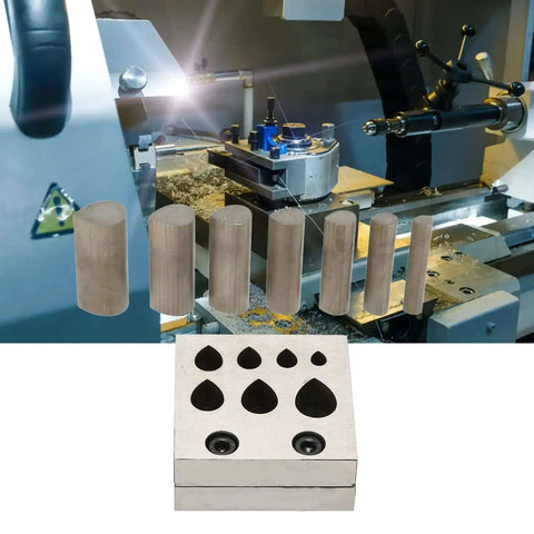 Drop Shaped Die Cutter Set For Jewelry Making 7 Piece Steel Disc Dies Pro tools in front of a metal forming machine.