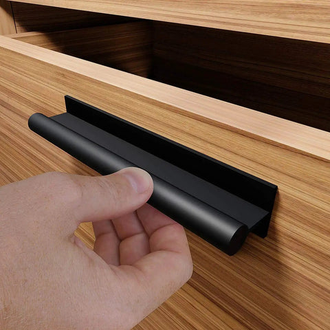 Self Adhesive Edge Finger Pull Door Handle Set Two Pack For Glass Wood Metal And Plastic Surfaces, installed on a wooden drawer