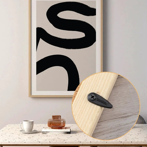 100 Pcs Metal Picture Frame Turn Button Fasteners With 100 Pcs Screws Black Backing Clips For Picture Frames Repair Kit To Secure Small Photos Posters And Paintings Without Damage Easy Install shown installed on wooden frame.