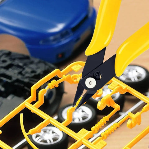 Micro wire cutter from Deburring Tool Set for 3D Printing and Plastic Models with 18 Piece Blade Pack cutting plastic model sprue.