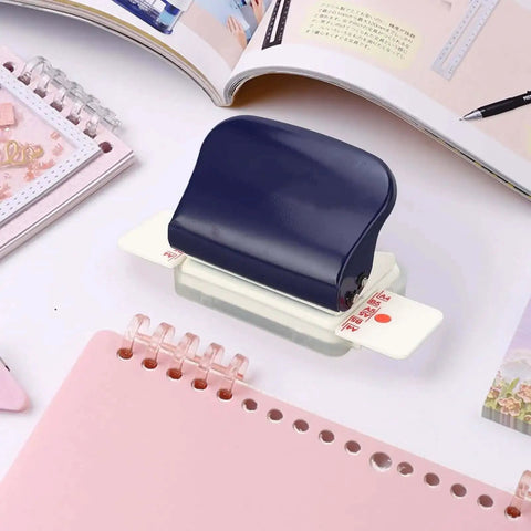 6 Hole Punch For Loose Leaf Paper A4 A5 B5 Size Handheld Metal Circle Puncher With Five Sheet Capacity on desk