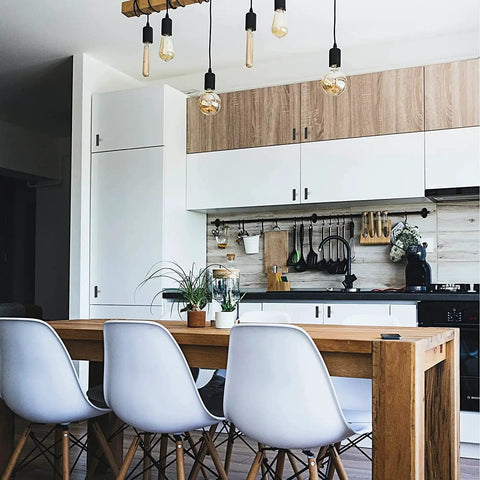 Modern kitchen with wooden table, white chairs, and cabinetry featuring 10 Pack Black Square Bar Cabinet Knobs 2 Inch Matte Black Square Cabinet Pulls.