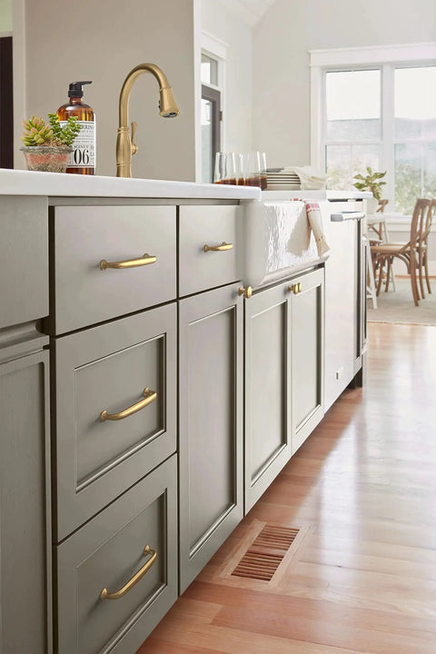 Renown Champagne Bronze Cabinet Pull Five And One Sixteenth Inch Center To Center Traditional Drawer Handle installed on kitchen cabinets
