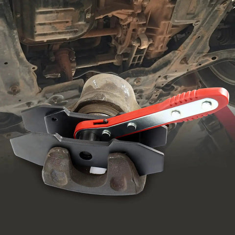 JoyFans brake caliper compression tool set with red handle and black spreader arms on a car brake caliper.