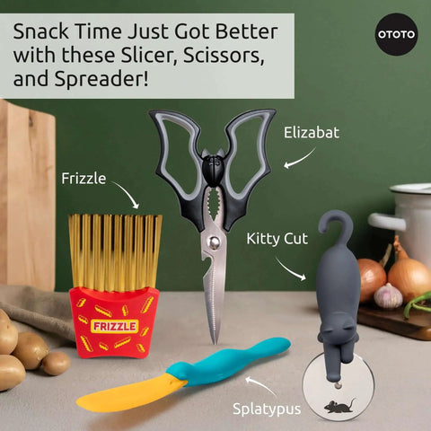 Frizzle Crinkle Fry Cutter with stainless steel blades, Kitty Cut scissors, and Splatypus spreader on a kitchen counter.