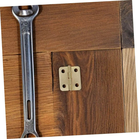 40 Piece Miniature Hinge Hardware Set for DIY Crafts Corner Iron Hinges for Jewelry Boxes and Small Cases Tiny Screws Included Perfect for Jewelry Making Woodworking and Mini Project Repairs shown installed on wood surface.