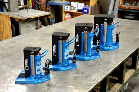 Heavy Duty Toe Jack Hydraulic Floor Lift For Containers And Machinery, 5 To 10 Ton Capacity, Ultra Low 0.875 Inch Clearance, displayed in a workshop