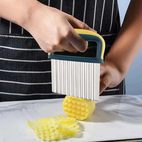Person using Crinkle Cutter Wave Knife, Stainless Steel Blade With Protective Case And Handle, Veggie Slicer for uniform slices on potato.