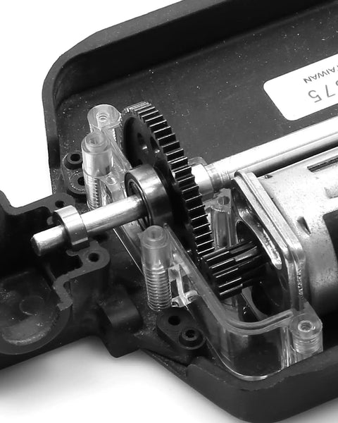 Close-up of Tough As Nails Hardened Steel Pinion Gear for 1/18 Scale RC Cars installed in Traxxas LaTrax Teton, CNC machined.