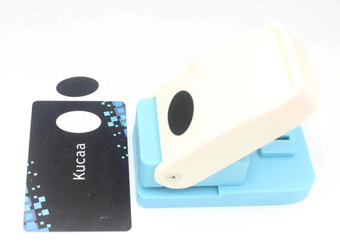 Oval Scrapbooking Punch For Paper Crafting One Inch 25mm Lever Embossing Punch shown with punched oval and sample card