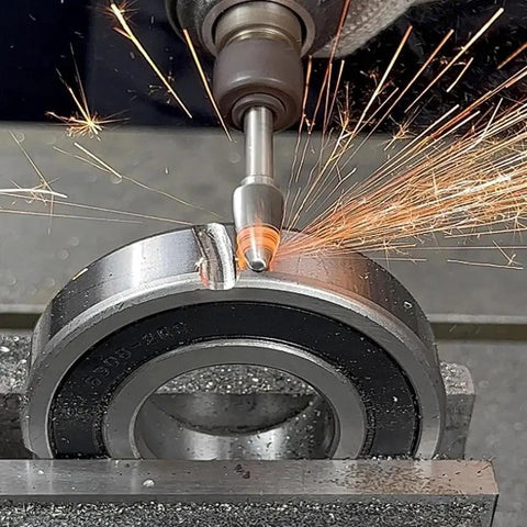 Beefy Carbide Burr Bit Tree Shape Double Cut 9/16 Inch Head in action on a metal surface with sparks, for die grinders.