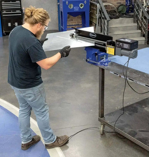 Person using Bead Roller Drive System With 1/6 HP 120V Motor, Variable Speed 0 To 20 RPM, And Foot Pedal Control on metal bead roller