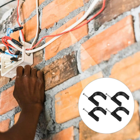 Installation of 100 Piece 25mm Round Black Plastic Tubing Clamps With Steel Nails on brick wall for cable management
