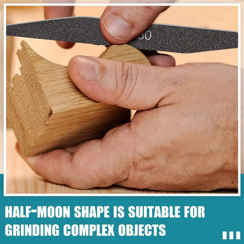 Close-up of hands using a half-moon sanding stick from a 20 Pcs Sanding Sticks Set For Plastic Models And 3D Prints, Assorted Grits on wood.