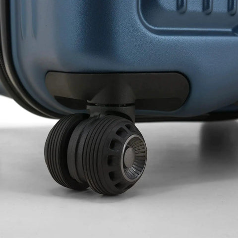 Close-up of wheel on Ultimax II 26 Inch Medium Trunk Spinner Luggage With Tie Down Straps Matte Navy Durable Polycarbonate Hardshell