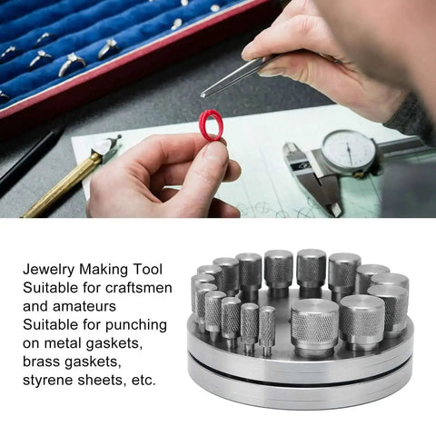 Hands using Steel Disc Cutter Set for Jewelry Making with tools and 45 steel die discs on a workbench for precise flat bottom punching.