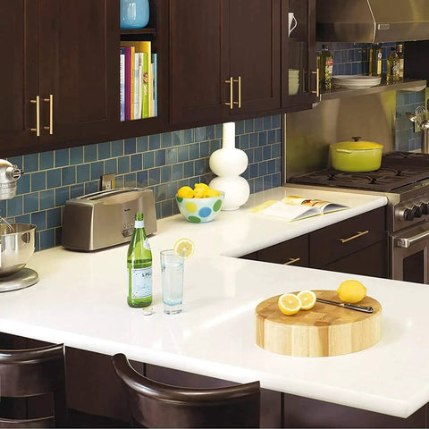 Modern kitchen with Forty Pack Brushed Gold Cabinet Pulls Modern Bar Drawer Handles for kitchen, featuring dark cabinets and white countertop.