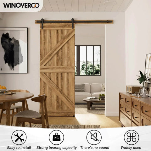 Built Tough 66 Inch Sliding Barn Door Hardware Kit With Five And A Half Foot Rail For Heavy Duty Aluminum Track System Adjustable U Shape Floor Guide Wall Mount Rail Splicing Track Kit Door Not Included Rust Resistant Coating installed in a modern room.