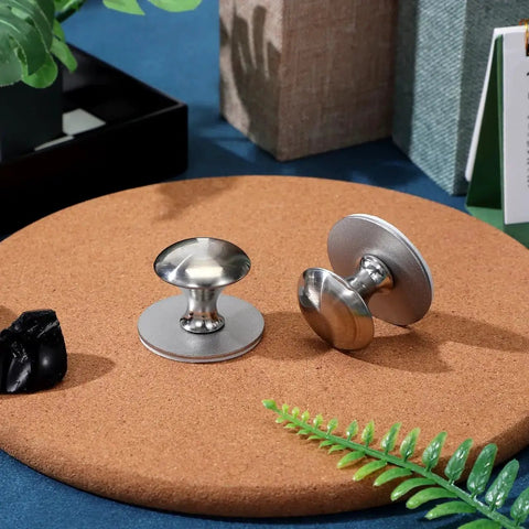 Two Pack Stainless Steel Suction Cup Handles displayed on a surface, modern sleek design, ideal for glass shower doors and cabinets, no drilling required.