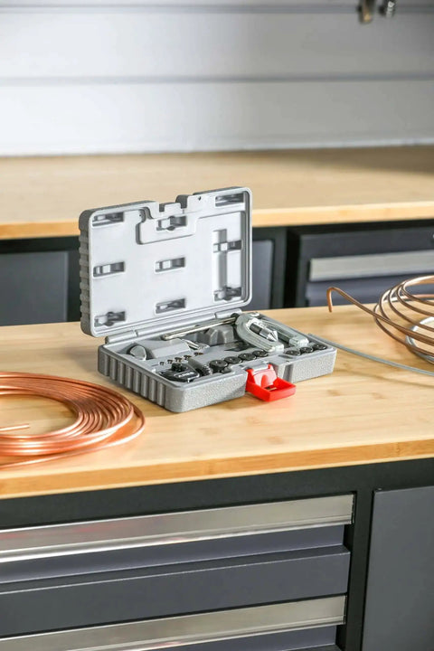 Heavy Duty Double Flaring Tool Set With Extra Adapters for Copper Aluminum Soft Steel Brake Lines and Brass Tubing on workbench