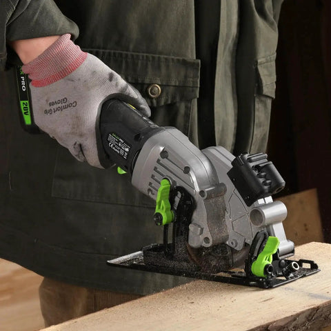 Person using Tiny But Mighty 20V Cordless Mini Circular Saw With Laser Guide, Rip Fence, And Dual Blades for precise wood cuts