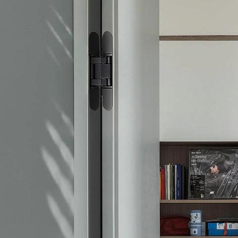 Hidden Door Hinges 7 Inch Set Heavy Duty Concealed Hinges Adjustable 180 Degree 3D Invisible Hinges For Secret Doors With Smooth Close And High Weight Capacity Up To 177 Lb Pacify installed on grey door frame