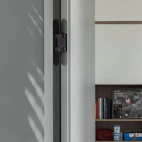 Hidden Door Hinges 6 Inch Heavy Duty 2 Pack Concealed 3D Adjustable Butt Hinges installed in a modern interior.