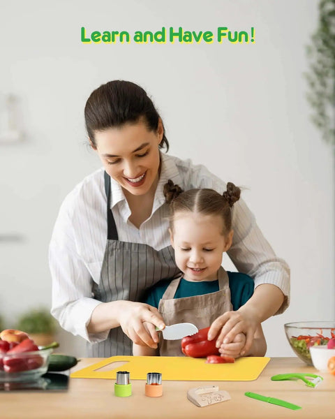 Parent and child using Kids Kitchen Knife Set 11 Pcs Montessori Tools For Toddlers 3 Plus Real Cooking Playset at a kitchen table.